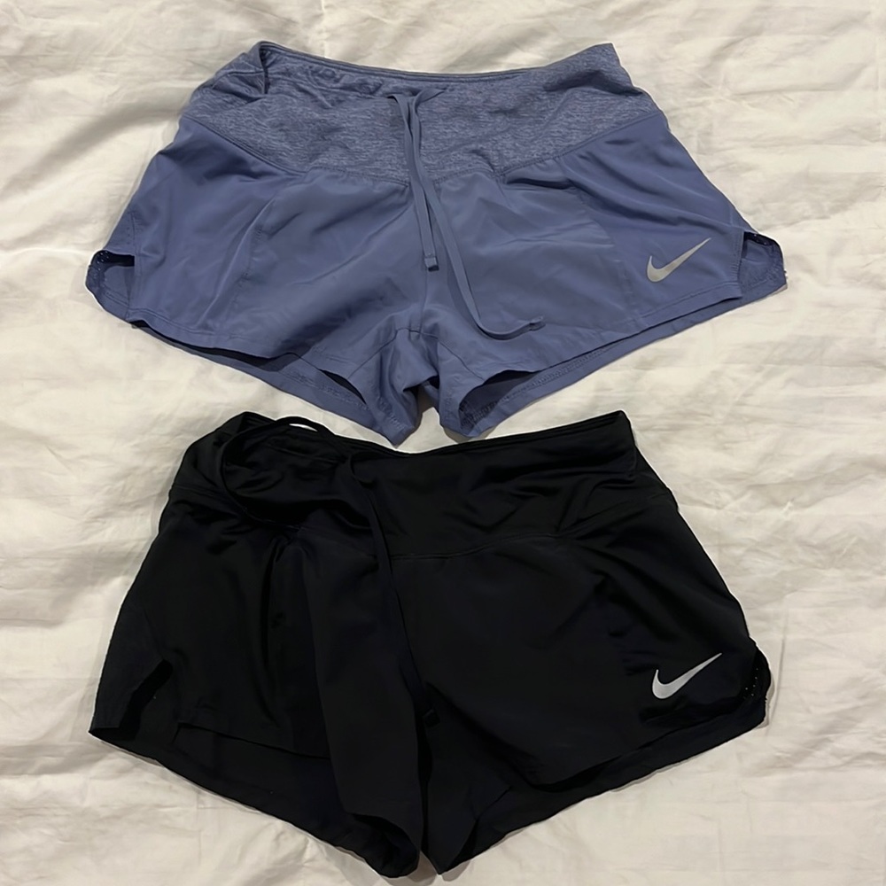Two Nike dri fit running shorts